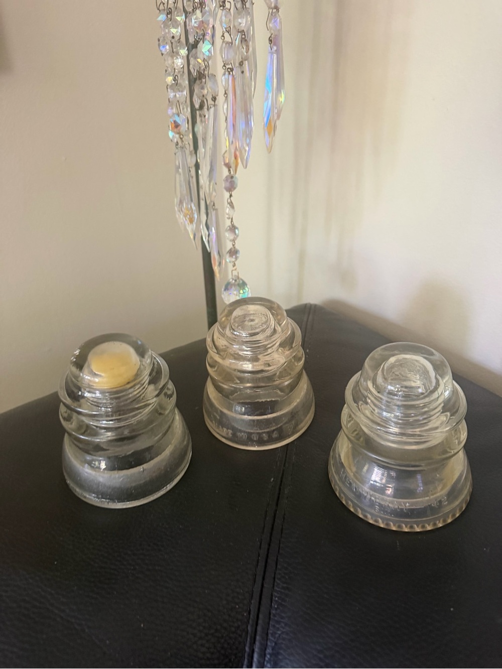 Antique trio glass insulators
